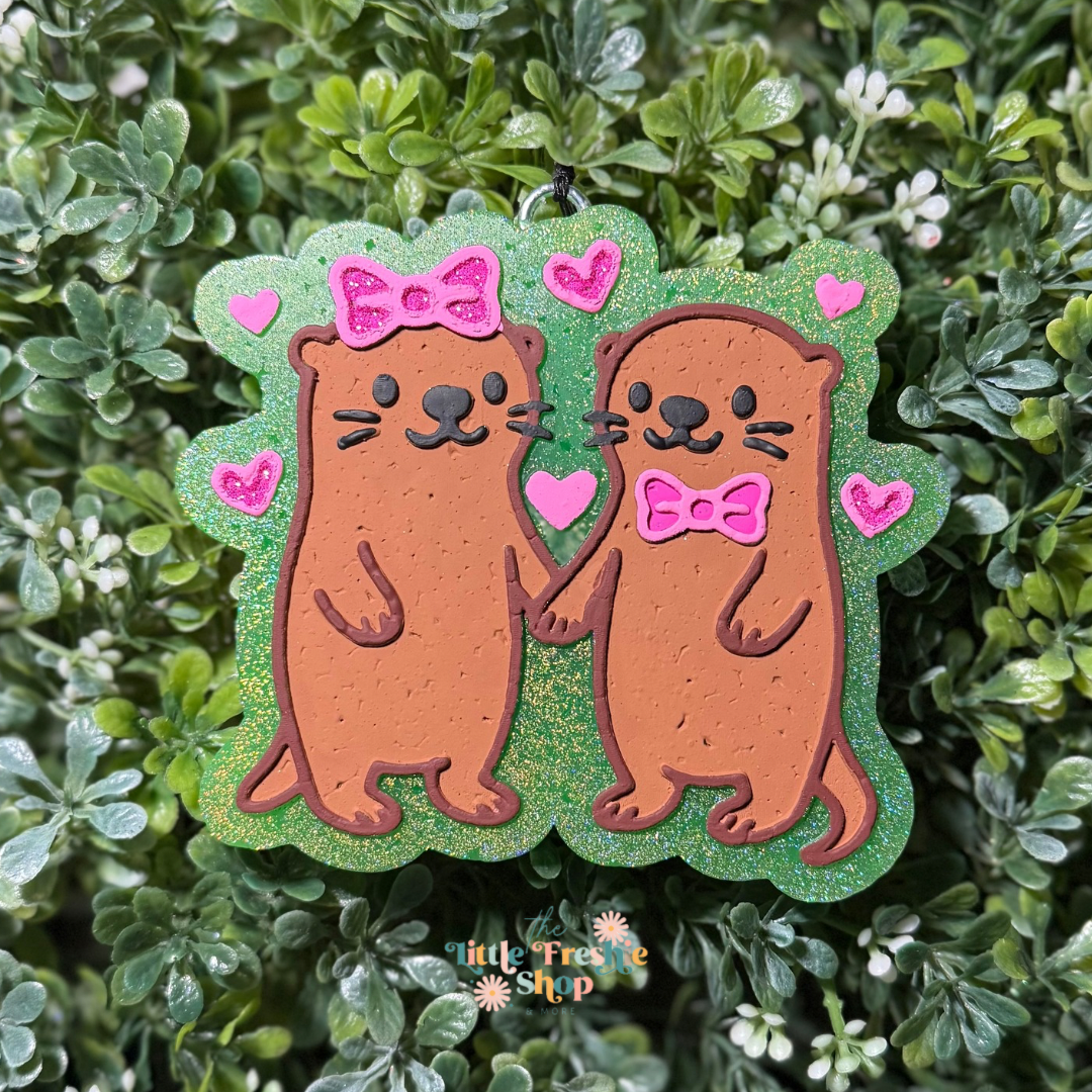 Otters Holding Hands Freshie