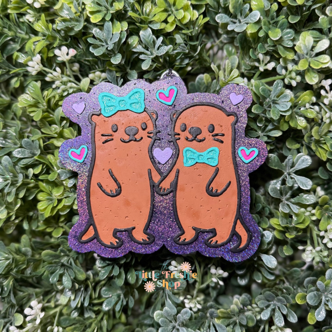 Otters Holding Hands Freshie