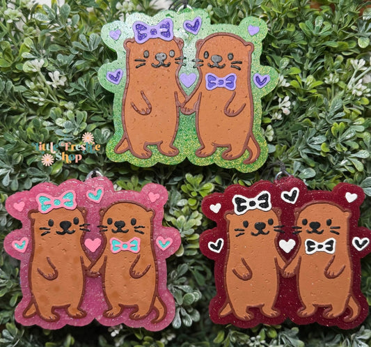 Otters Holding Hands Freshie